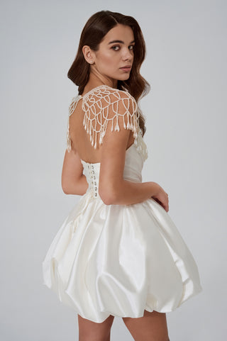 Set with a corset and two pleated skirts — a short fluffy one and a long straight one