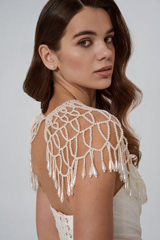 Set with a corset and two pleated skirts — a short fluffy one and a long straight one