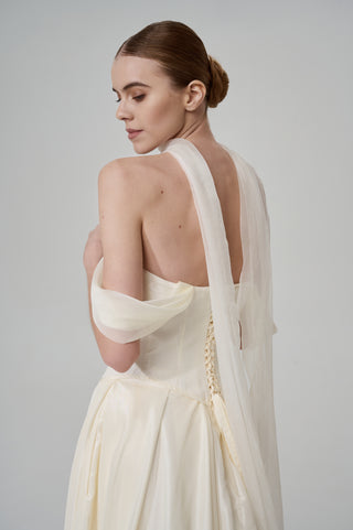 Wedding set with a lace-up corset with dropped sleeves made of chiffon and a fluffy A-line skirt with a long train and a loop for the arms