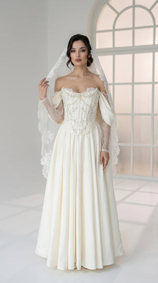 Wedding dress-transformer with separate corset — fluffy skirt with pleats, lace sleeves, and pearl embroidery