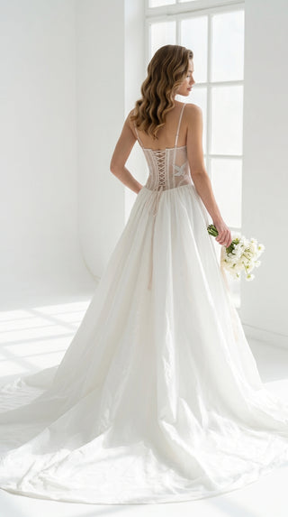 Delicate transparent corset with bird embroidery and textured skirt with train - designer piece by Caribis