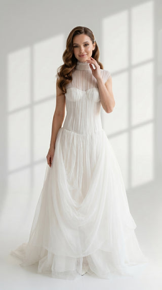 Laconic dress made of natural chiffon with a high neck and a flowing silhouette