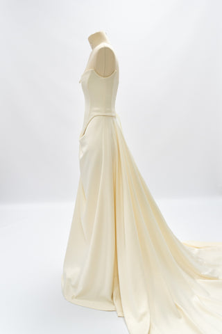 Satin corset with rounded bottom and A-line skirt — open corset without straps with draped skirt with train