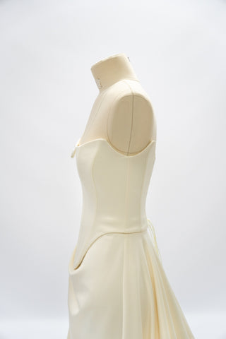 Satin corset with rounded bottom and A-line skirt — open corset without straps with draped skirt with train