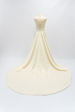 Satin corset with rounded bottom and A-line skirt — open corset without straps with draped skirt with train