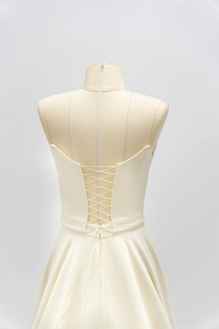 Satin corset with rounded bottom and A-line skirt — open corset without straps with draped skirt with train