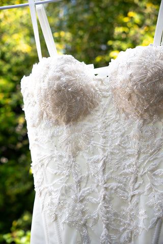 Exquisite corset with luxurious voluminous embroidery and a delicate transparent base