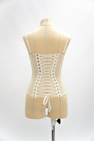 Exquisite corset with luxurious voluminous embroidery and a delicate transparent base