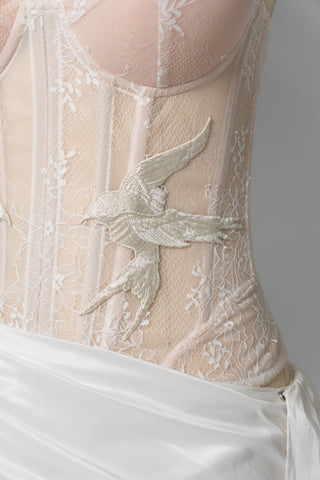 Delicate transparent corset with bird embroidery and textured skirt with train - designer piece by Caribis