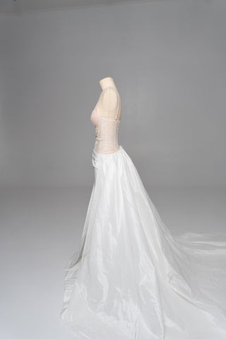 Delicate transparent corset with bird embroidery and textured skirt with train