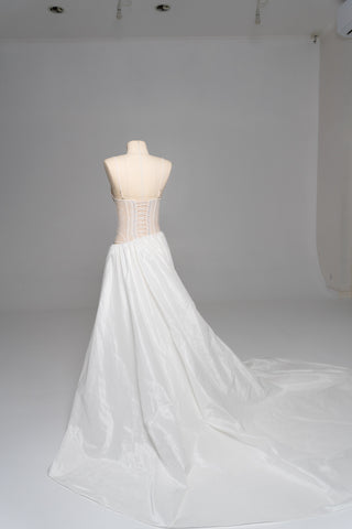 Delicate transparent corset with bird embroidery and textured skirt with train