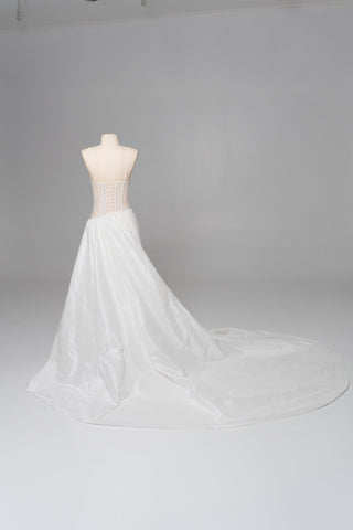 Delicate transparent corset with bird embroidery and textured skirt with train