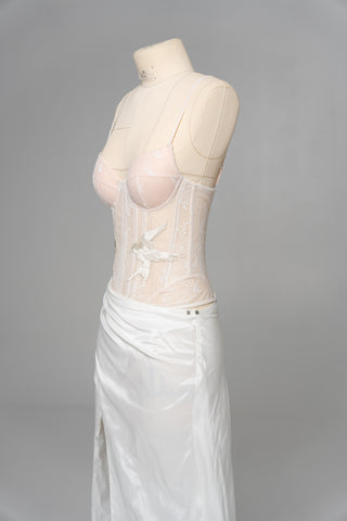 Delicate transparent corset with bird embroidery and textured skirt with train