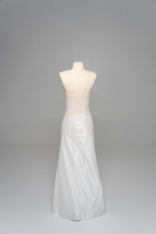 Delicate transparent corset with bird embroidery and textured skirt with train