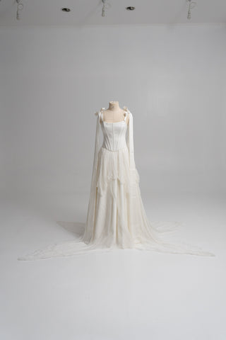a sophisticated Ivory two-piece with a structured satin bodice and a light silk Skirt is a versatile choice for the Modern bride L / Ivory / Skirt a sophisticated Ivory two-piece with a structured satin bodice and a light silk Skirt is a versatile choice for the Modern bride L / Ivory / Skirt