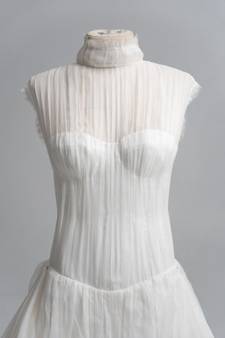 Laconic dress made of natural chiffon with a high neck and a flowing silhouette - designer piece by Caribis