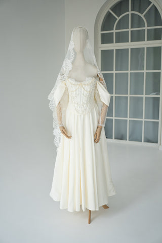 Wedding dress-transformer with separate corset — fluffy skirt with pleats, lace sleeves, and pearl embroidery