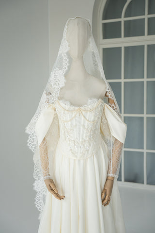Wedding dress-transformer with separate corset — fluffy skirt with pleats, lace sleeves, and pearl embroidery