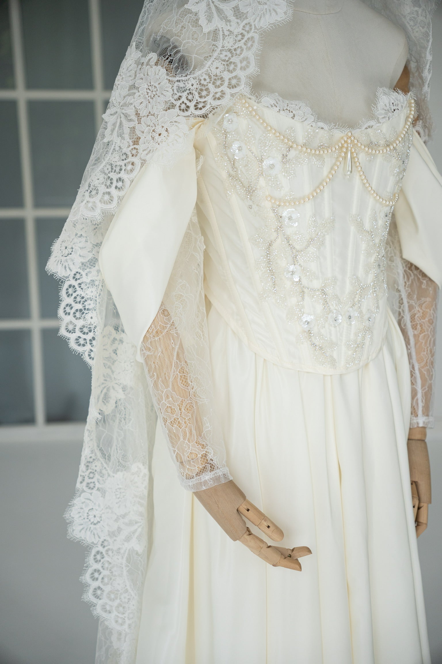 Wedding dress-transformer with separate corset — fluffy skirt with pleats, lace sleeves, and pearl embroidery
