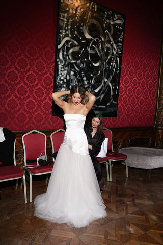 Wedding dress with a shifted waistline - a combination of silky satin and airy tulle