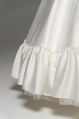 Wedding dress with a corset bodice, dropped straps, and a full skirt