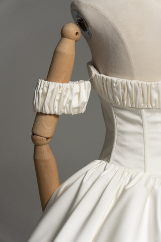 Short wedding dress with a corset bodice and a full skirt