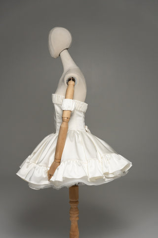 Short wedding dress with a corset bodice and a full skirt