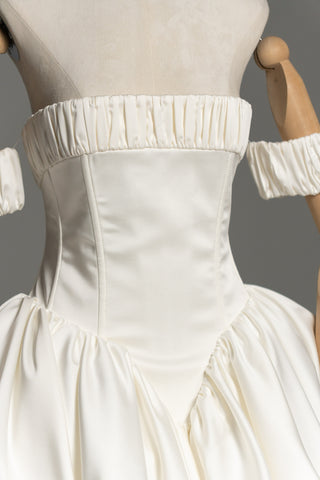 Short wedding dress with a corset bodice and a full skirt