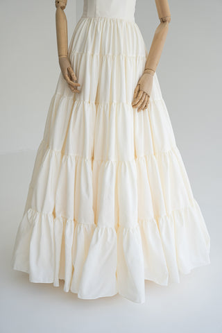 Wedding dress with taffeta bodice — features open shoulders, tiered hem, and multi-layered skirt