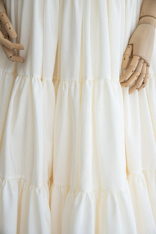 Wedding dress with taffeta bodice — features open shoulders, tiered hem, and multi-layered skirt