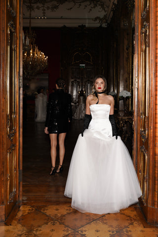 Wedding dress with a shifted waistline - a combination of silky satin and airy tulle