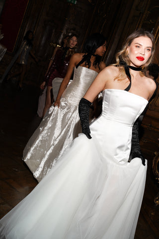 Wedding dress with a shifted waistline - a combination of silky satin and airy tulle