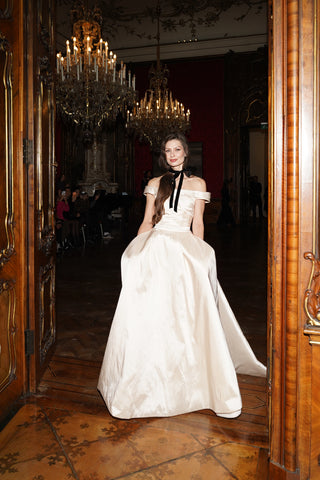 Tanya Bohdan x Caribis off-the-shoulder wedding dress - silky material, lacing on the back, and a long train