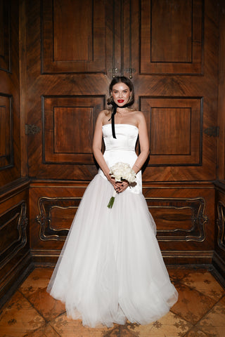 Wedding dress with a shifted waistline - a combination of silky satin and airy tulle