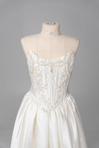 Set with a hand-embroidered beaded corset with lacing and a skirt with a slit