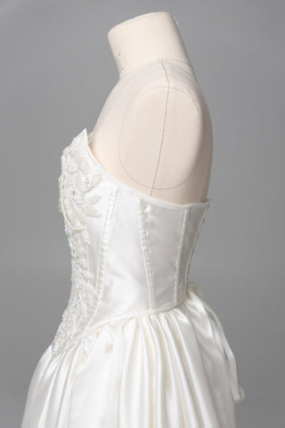 Set with a hand-embroidered beaded corset with lacing and a skirt with a slit