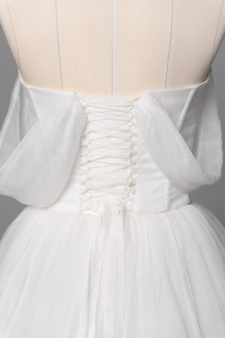 Natural silk set with asymmetrical elements — a corset with dropped sleeves and a skirt with different length options