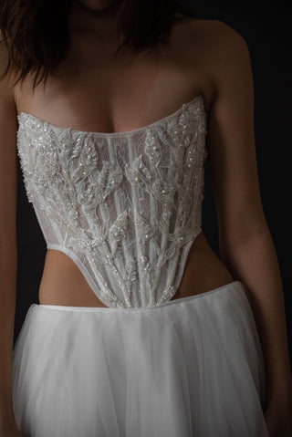 Wedding dress with pearl-embroidered corset and two-tier tulle skirt