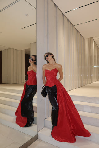 Red corset with train — a striking accent for special occasions