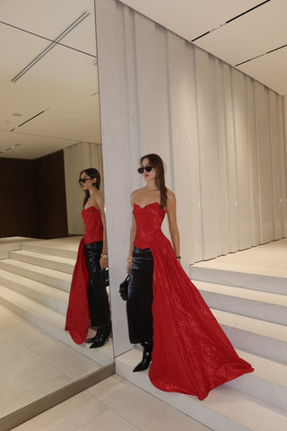 Red corset with train — a striking accent for special occasions