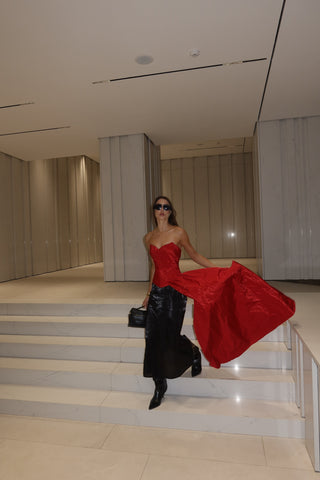 Red corset with train — a striking accent for special occasions