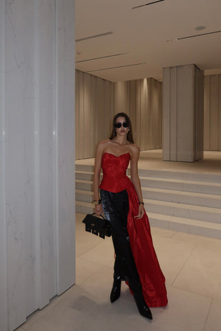 Red corset with train — a striking accent for special occasions