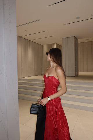 Red corset with train — a striking accent for special occasions