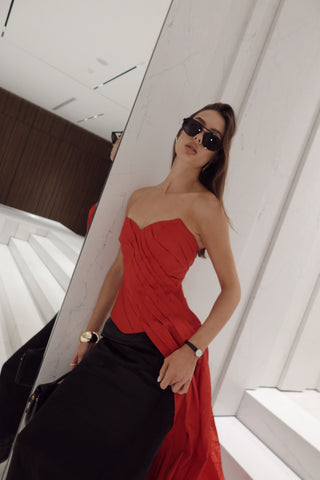 Red corset with train — a striking accent for special occasions