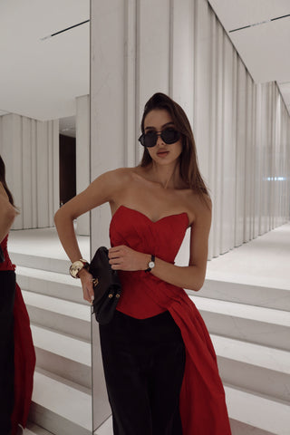 Red corset with train — a striking accent for special occasions
