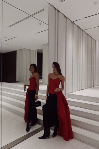 Red corset with train — a striking accent for special occasions