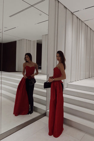 Red corset with train — a striking accent for special occasions