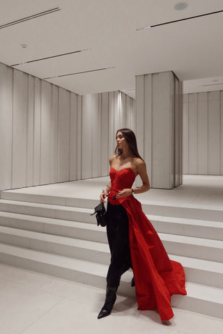 Red corset with train — a striking accent for special occasions