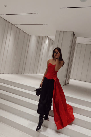 Red corset with train — a striking accent for special occasions