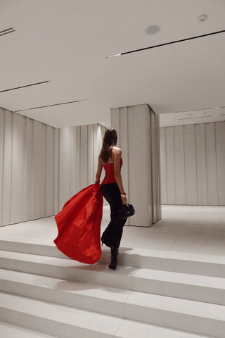 Red corset with train — a striking accent for special occasions